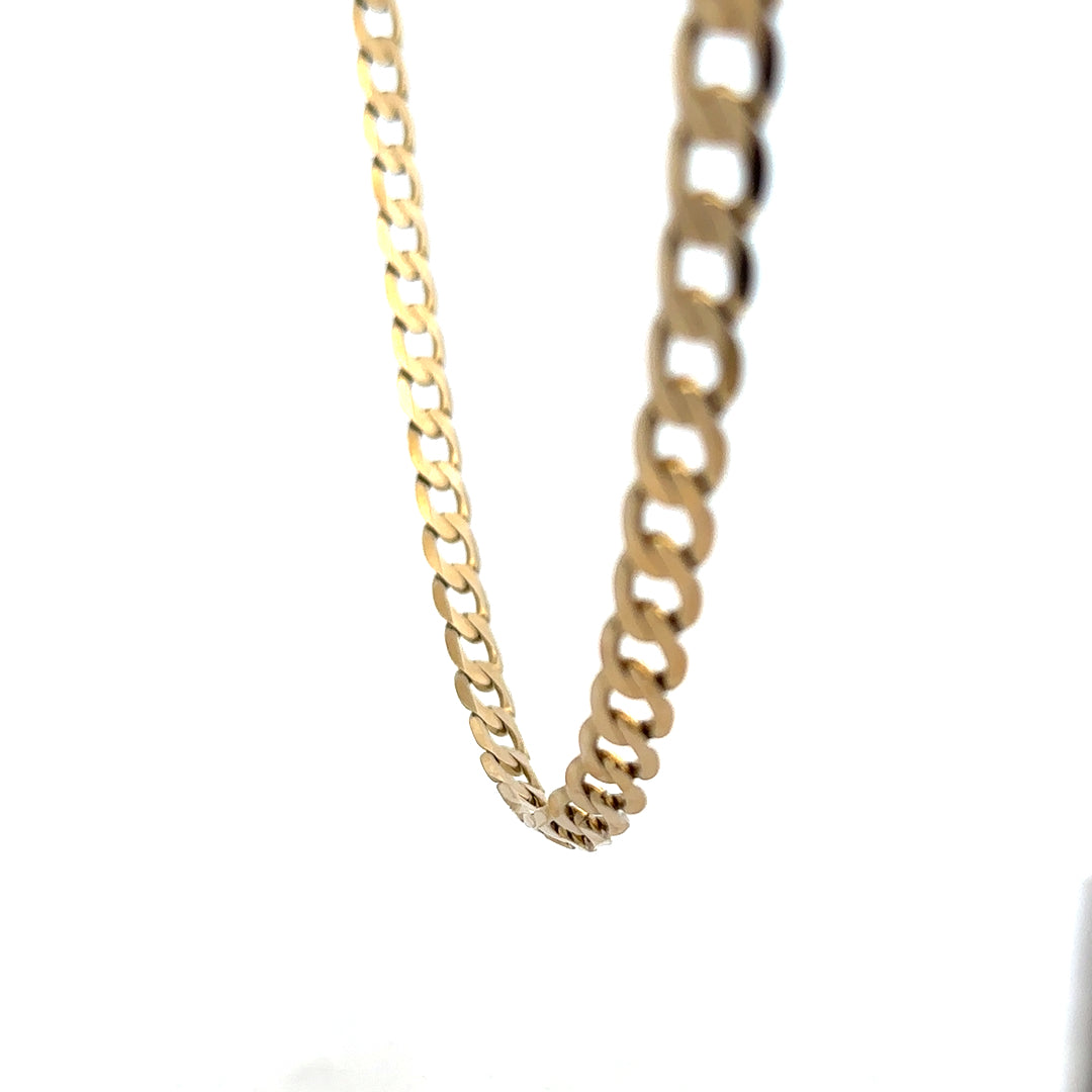 9ct yellow gold curb chain weighing 30.3g, featuring a classic link design, unbranded jewelry accessory.