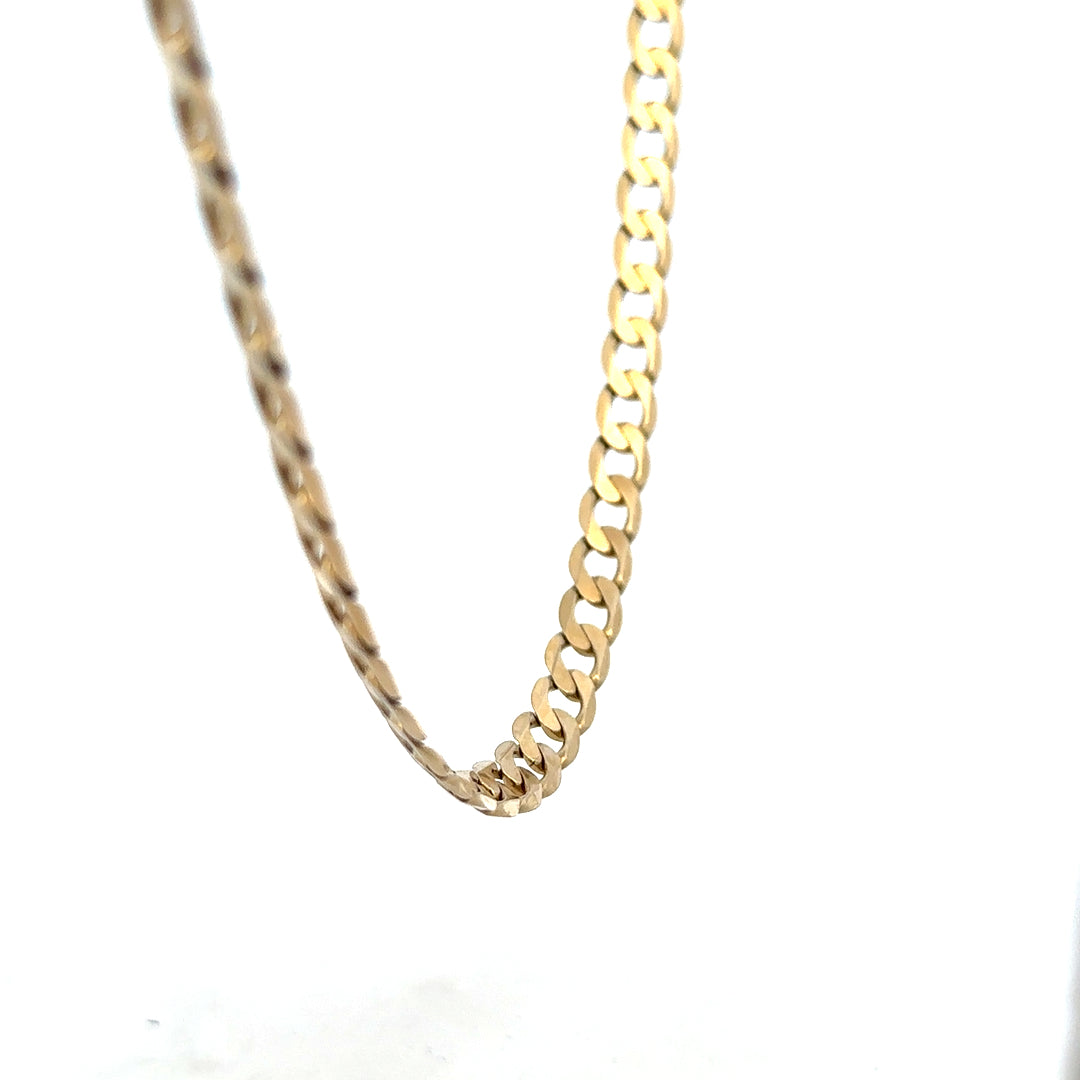 9ct yellow gold curb chain weighing 30.3g, featuring classic linked design, unbranded jewelry accessory for men or women.