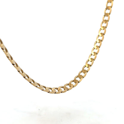9ct yellow gold curb chain weighing 30.3g, featuring a classic linked design and polished finish.