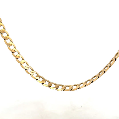 9ct yellow gold curb chain weighing 30.3g, featuring a classic linked design and polished finish.