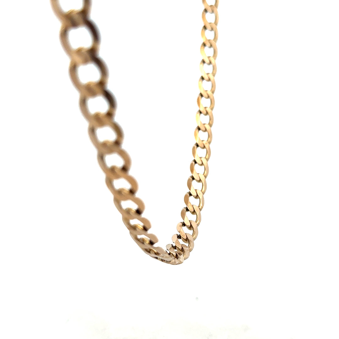 9ct yellow gold curb chain weighing 38.8g, featuring a classic link design, unbranded jewelry accessory.