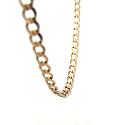 9ct yellow gold curb chain weighing 38.8g, featuring a classic link design, unbranded jewelry accessory.