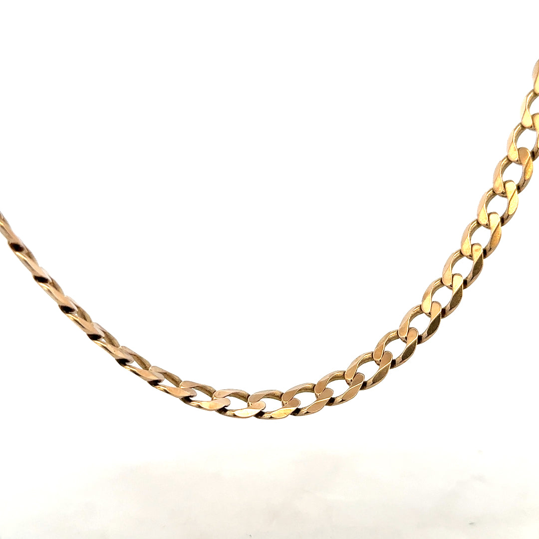 9ct yellow gold curb chain weighing 38.8g, featuring a classic linked design, unbranded jewelry accessory.