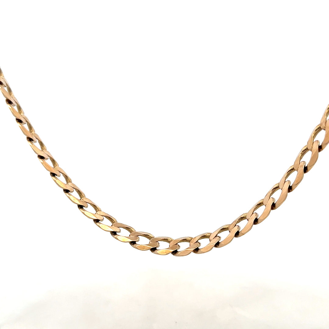 9ct yellow gold curb chain weighing 38.8g, unbranded jewelry with a classic design and polished finish.