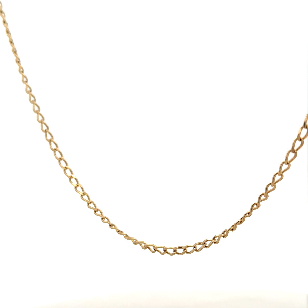 9ct yellow gold curb chain weighing 5.9g, featuring a classic linked design, unbranded jewelry accessory for everyday wear.