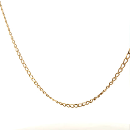 9ct yellow gold curb chain weighing 5.9g, featuring a classic linked design, unbranded jewelry accessory for everyday wear.