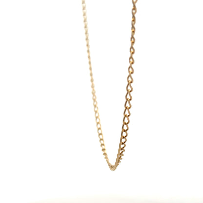 9ct yellow gold curb chain weighing 5.9g, displayed on a plain background with a close-up view of the chain links.