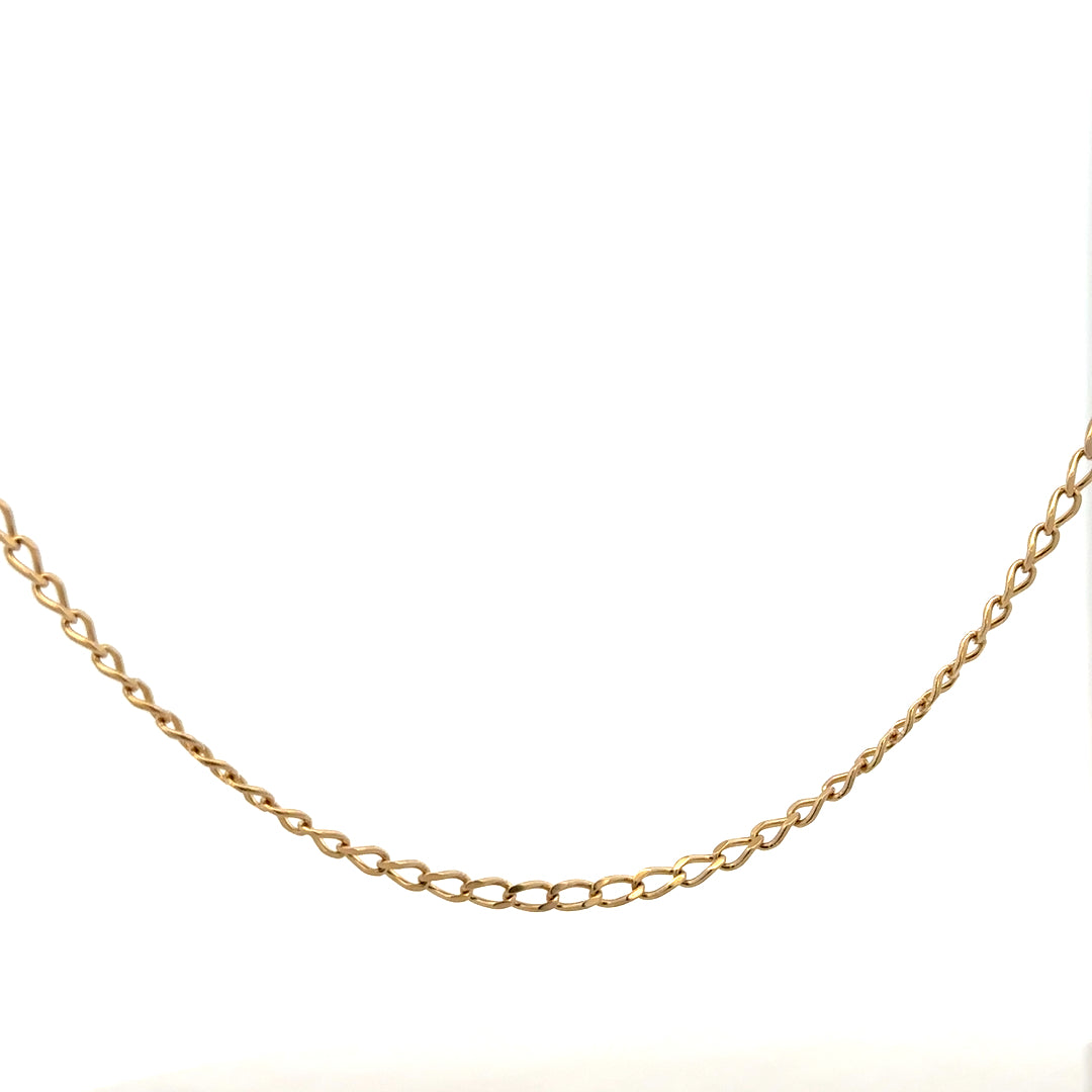 9ct yellow gold curb chain weighing 5.9g, featuring classic design and polished finish, suitable for everyday wear.