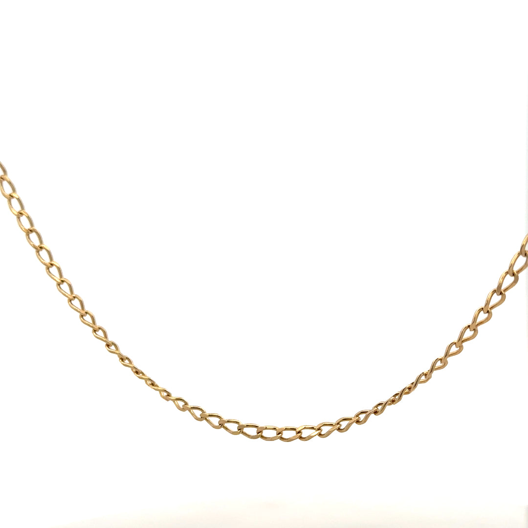 9ct yellow gold curb chain weighing 5.9g, unbranded jewelry with a classic link design shown in the product image.
