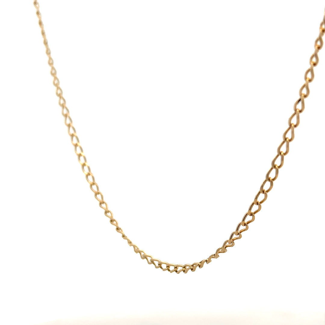 9ct yellow gold curb chain weighing 5.9g, unbranded jewelry with a classic linked design, close-up view of the chain.