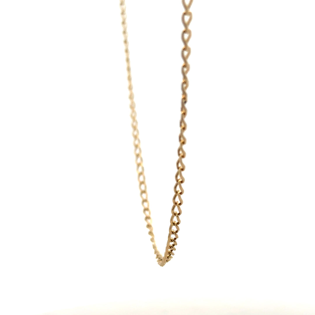 9ct yellow gold curb chain weighing 5.9g, featuring a classic interlinked design, unbranded jewelry accessory.