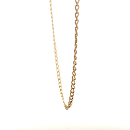 9ct yellow gold curb chain weighing 5.9g, featuring a classic interlinked design, unbranded jewelry accessory.