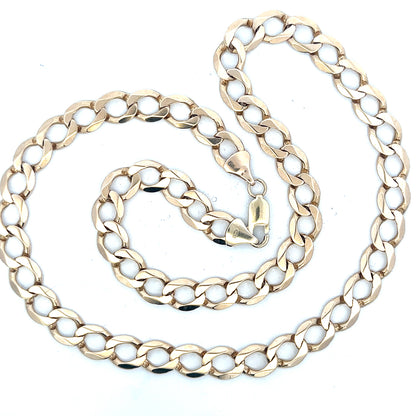 9ct yellow gold curb chain weighing 53.9g, unbranded jewelry with a classic link design, shown in close-up.