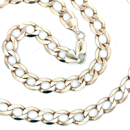 9ct yellow gold curb chain weighing 53.9g, unbranded jewelry with a classic design and polished finish.