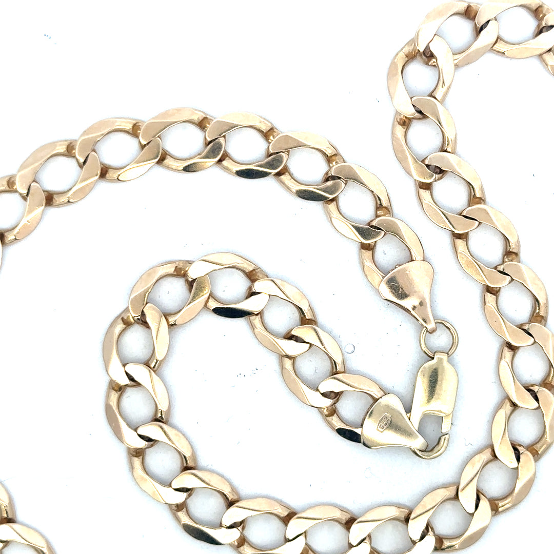9ct yellow gold curb chain weighing 53.9g, unbranded jewelry accessory with a classic link design.