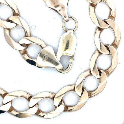 9ct yellow gold curb chain weighing 53.9g, unbranded jewelry with a classic linked design.