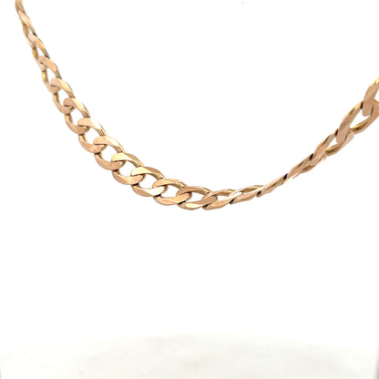 9ct yellow gold curb chain weighing 61.2g, displayed with detailed links and polished finish, unbranded jewelry accessory.