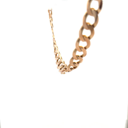 9ct yellow gold curb chain weighing 61.2g, featuring classic interlocking links, unbranded jewelry accessory.