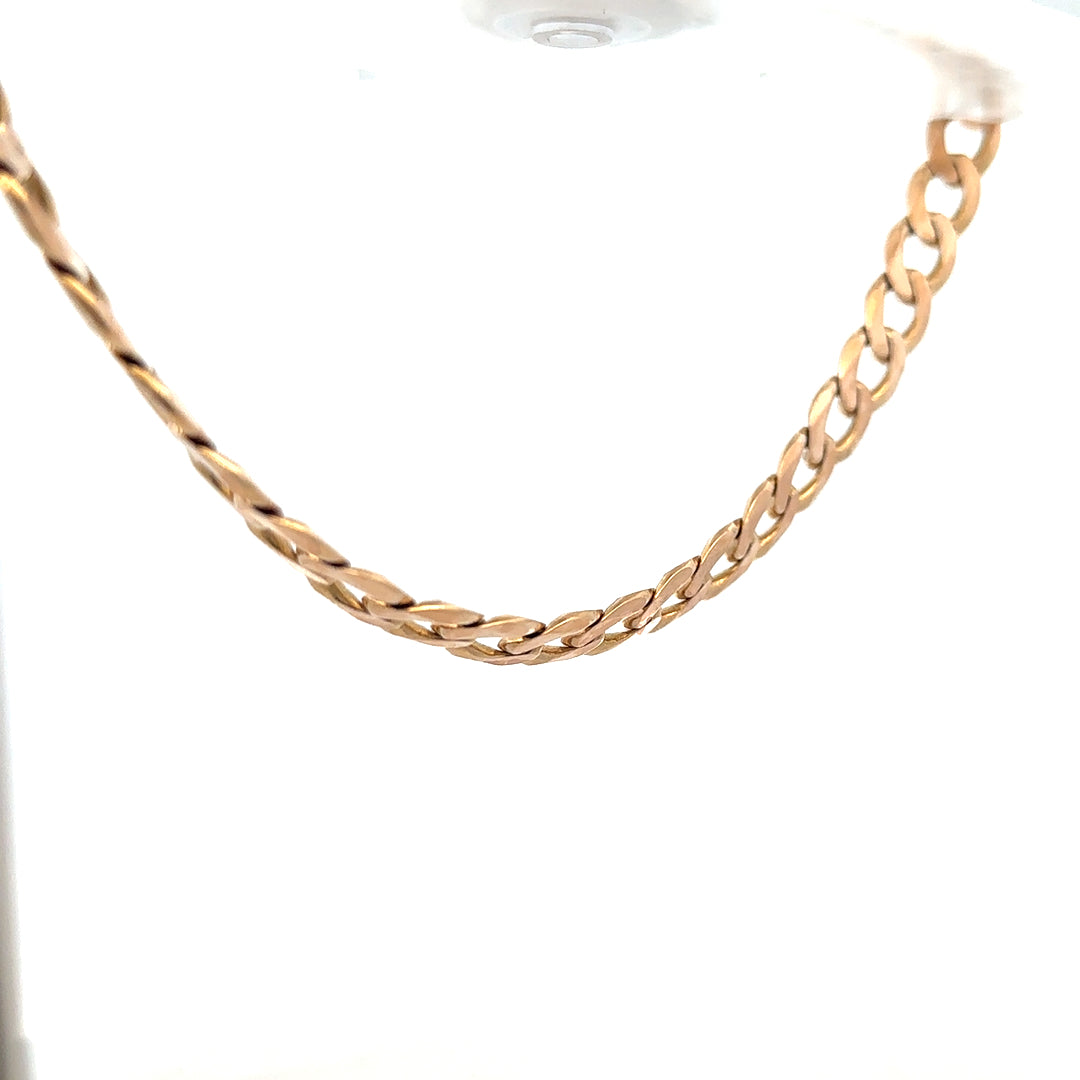 9ct yellow gold curb chain weighing 61.2g, featuring a classic link design, unbranded jewelry accessory.