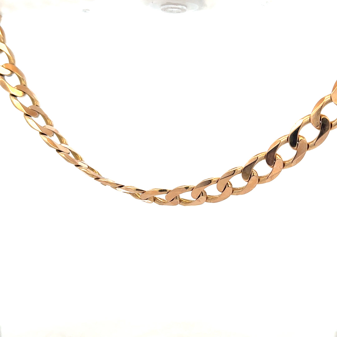 9ct yellow gold curb chain weighing 61.2g, with a classic linked design and secure clasp, unbranded jewelry accessory.