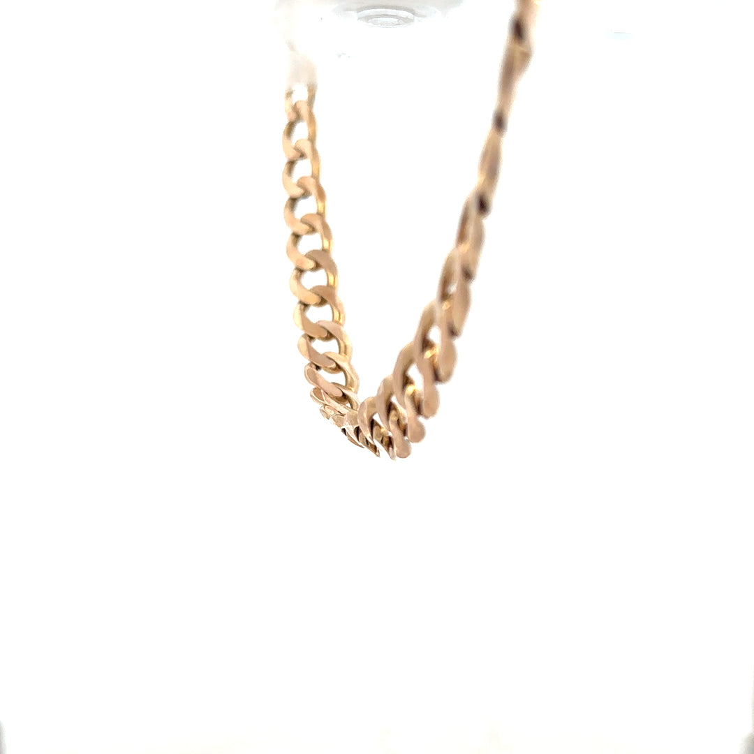 9ct yellow gold curb chain weighing 61.2g, featuring classic links and smooth finish, unbranded jewelry accessory.