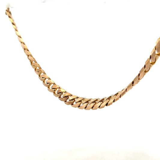 9ct yellow gold curb chain weighing 61.4g, showcasing a sturdy, classic link design with a secure clasp.