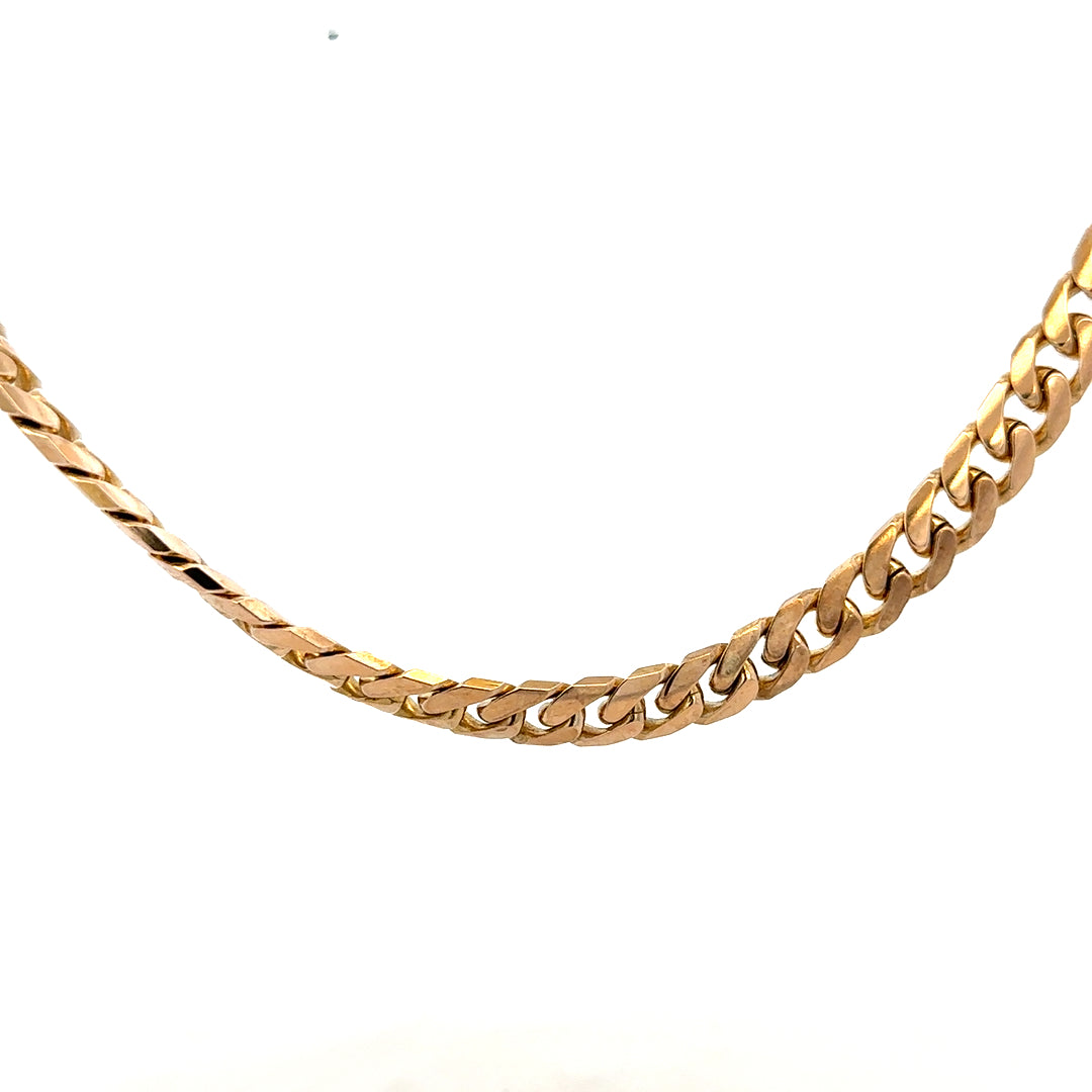 9ct yellow gold curb chain weighing 61.4g, featuring classic interlinked design, unbranded jewelry accessory.