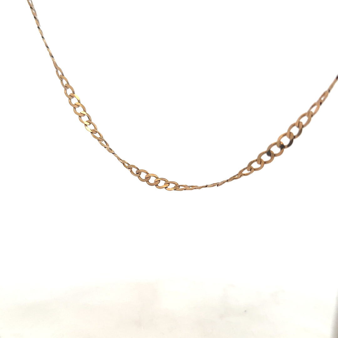9ct yellow gold curb chain weighing 8.5g, featuring classic linked design and polished finish, unbranded jewelry accessory