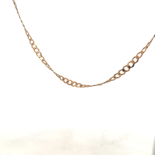 9ct yellow gold curb chain weighing 8.5g, featuring classic linked design and polished finish, unbranded jewelry accessory