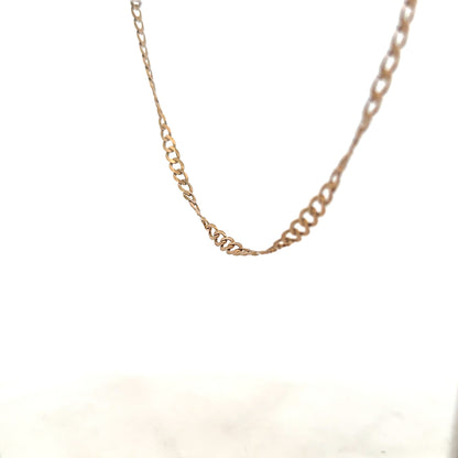 9ct yellow gold curb chain weighing 8.5g, unbranded jewelry with a classic link design, shown in a close-up image.