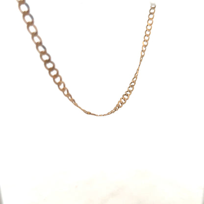 9ct yellow gold curb chain weighing 8.5g, featuring classic interlocking links, unbranded jewelry accessory.