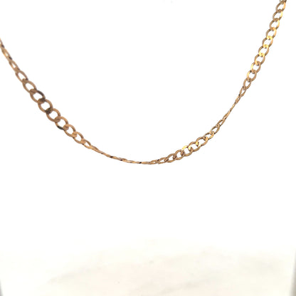 9ct yellow gold curb chain weighing 8.5g, displayed close-up with detailed links showcasing its craftsmanship and shine.