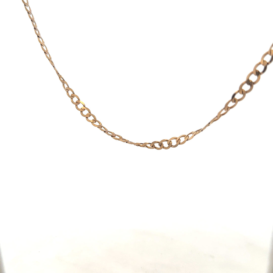 9ct yellow gold curb chain weighing 8.5g, unbranded, with a classic linked design suitable for jewelry or pendant wear