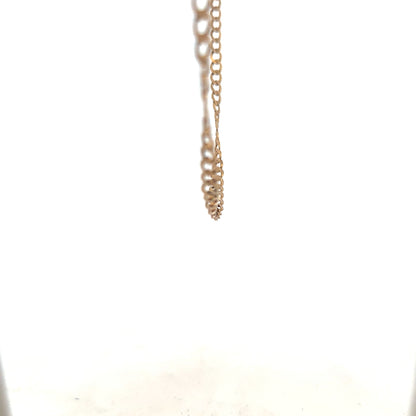 9ct yellow gold curb chain weighing 8.5g, showcasing a classic link design and polished finish.
