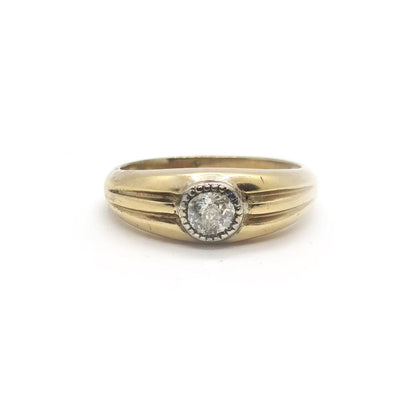 9ct yellow gold diamond ring with a simple band and sparkling diamonds, showcasing elegance and fine jewelry craftsmanship.