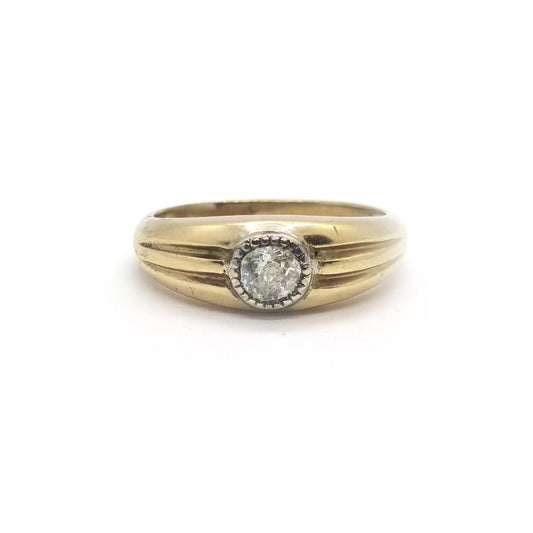 9ct yellow gold diamond ring with a simple band and sparkling diamonds, showcasing elegance and fine jewelry craftsmanship.