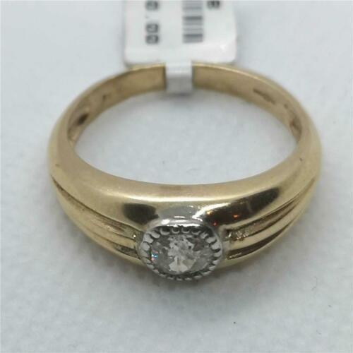 9ct yellow gold diamond ring with a sleek band and sparkling diamonds, showcasing elegant jewelry design.