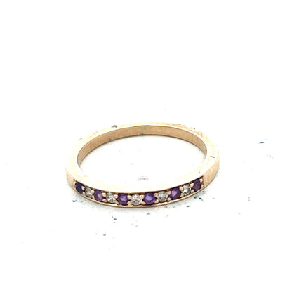 9ct yellow gold diamond and amethyst ring in size N, featuring a central amethyst gemstone and diamond accents.