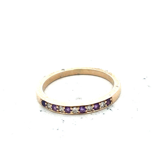 9ct yellow gold diamond and amethyst ring in size N, featuring a central amethyst gemstone and diamond accents.