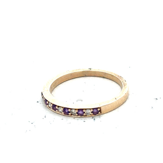 9ct yellow gold ring with diamond and amethyst gemstones, size N, featuring a elegant design and vibrant purple and clear stones.
