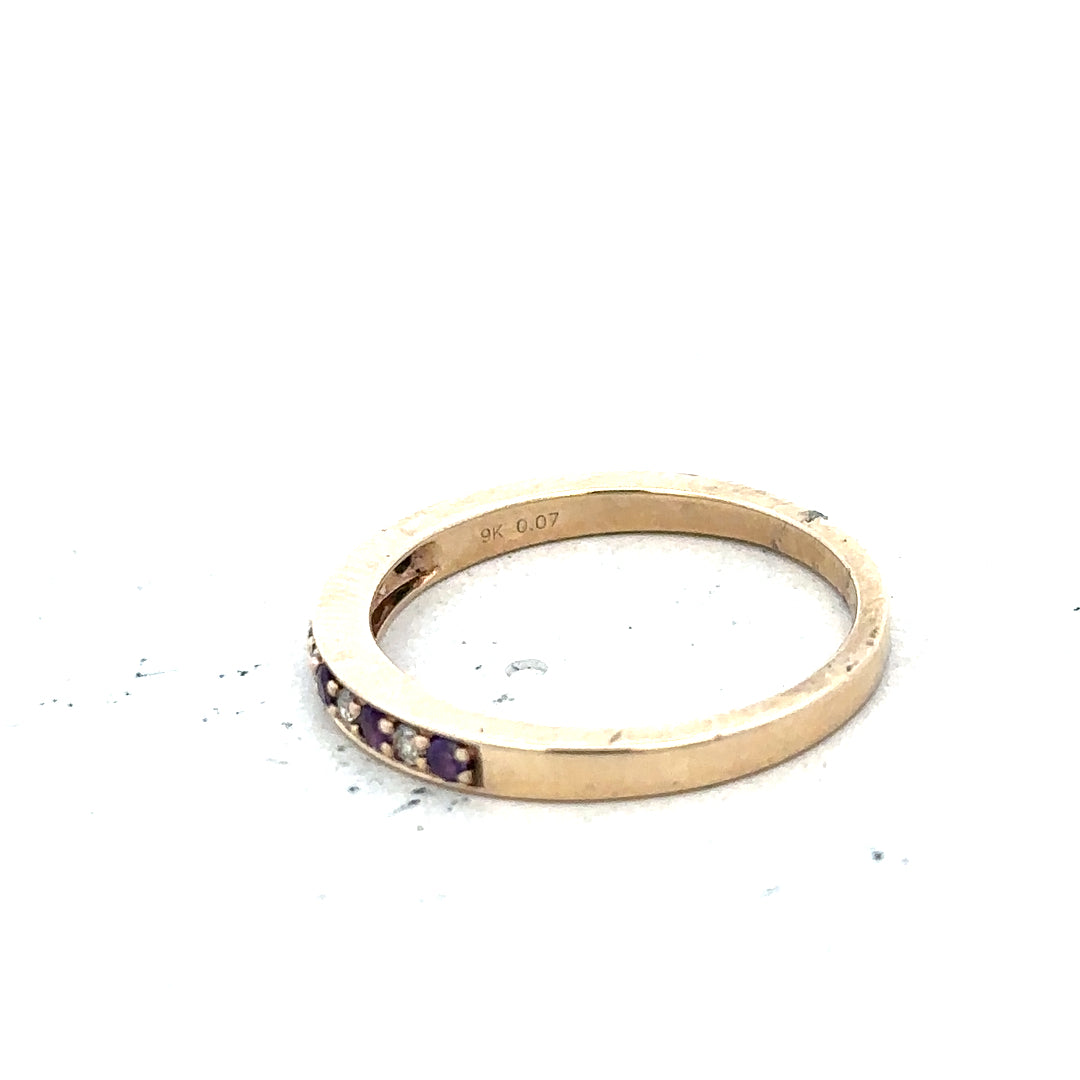 9ct yellow gold diamond and amethyst ring in size N, featuring a central purple gemstone and sparkling diamond accents.