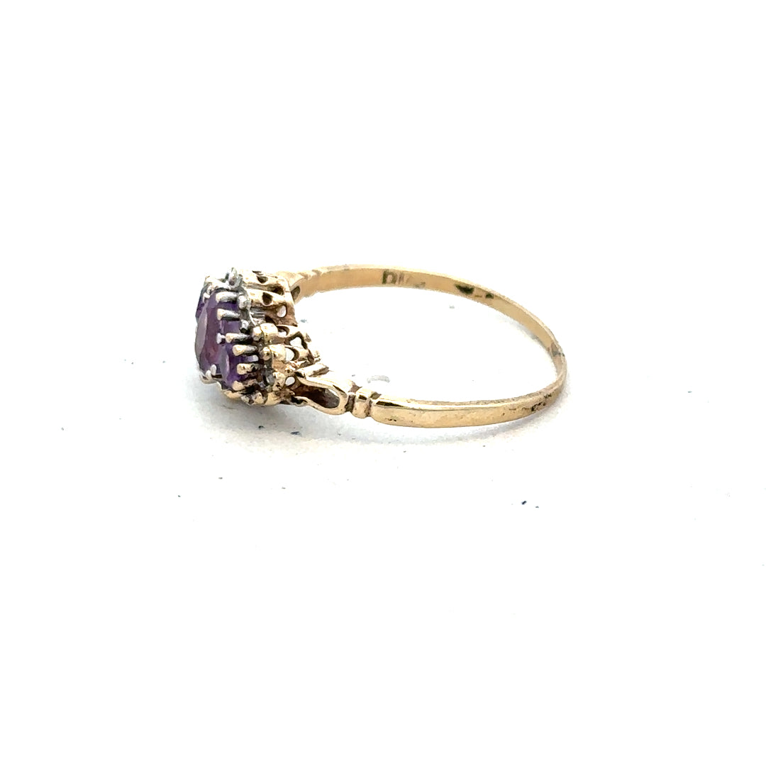 9ct yellow gold ring with diamond and amethyst gemstones, size Q, featuring a detailed design with sparkling stones.
