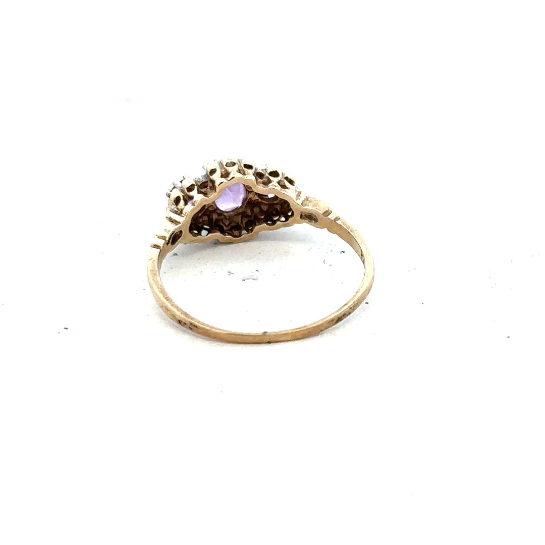 9ct yellow gold ring with diamond and amethyst gemstones, size Q, featuring intricate design and vibrant purple and clear stones.