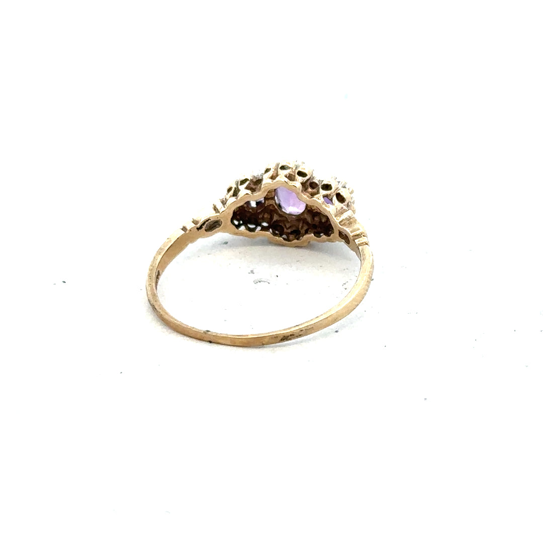 9ct yellow gold ring with diamond and amethyst gemstones, size Q, featuring a detailed gemstone design.