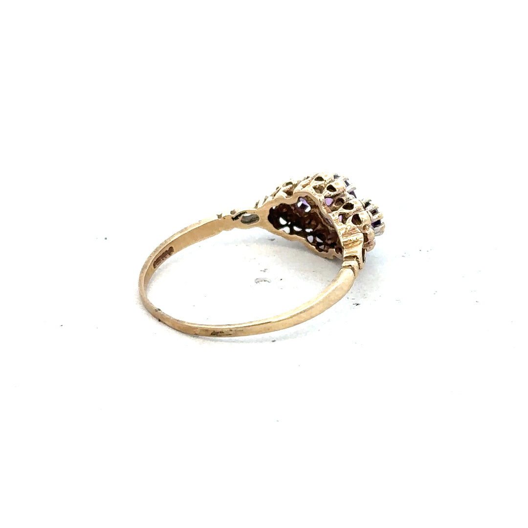 9ct yellow gold ring with diamond and amethyst gemstones, size Q, featuring elegant design and vibrant purple and clear stones.