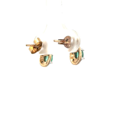 9ct yellow gold diamond and emerald earrings, unbranded, featuring sparkling diamonds and vibrant emeralds, weighing 1.2g.