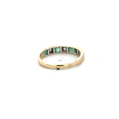 9ct yellow gold ring with diamond and emerald accents, size K, showcasing detailed craftsmanship and sparkling gemstone design.