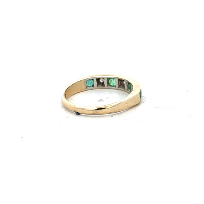 9ct yellow gold ring with diamonds and emeralds, size K, featuring intricate gemstone detailing and a polished gold band.