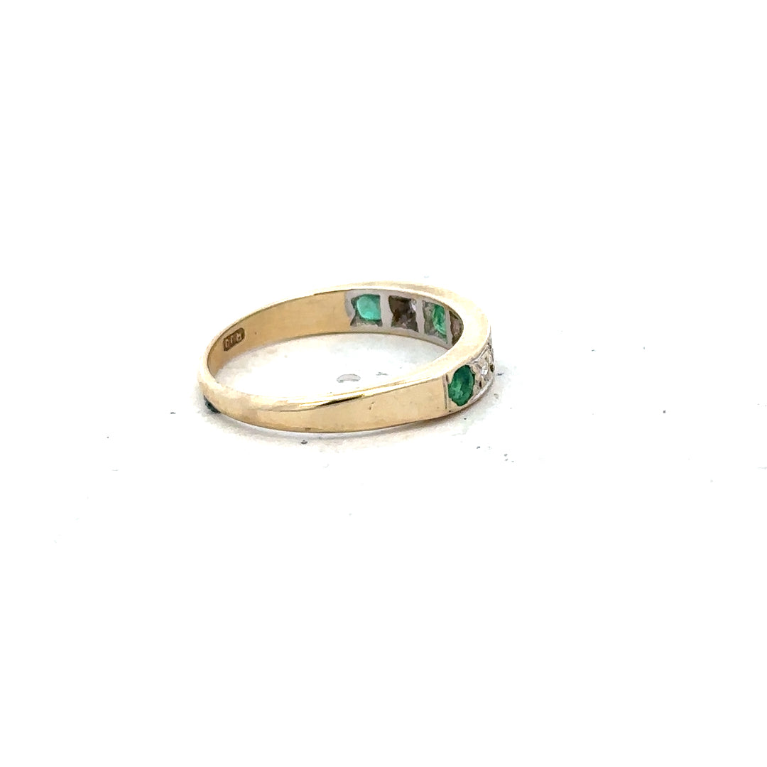 9ct yellow gold ring with diamonds and emeralds, size K, featuring a detailed design and sparkling gemstone accents.