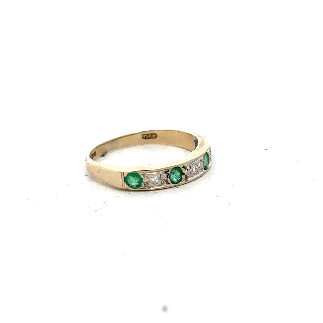 9ct yellow gold ring with diamond and emerald accents, size K, featuring detailed craftsmanship and elegant design.
